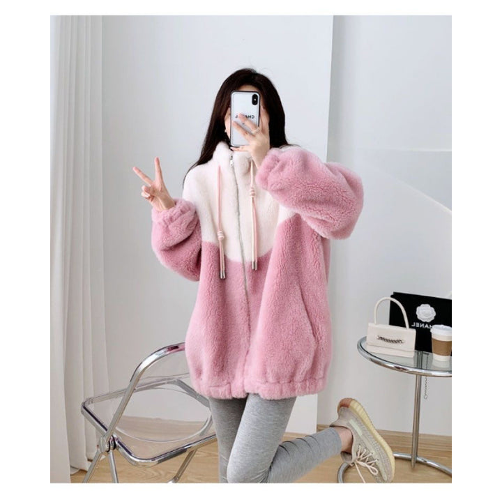 Women’s plush jacket with high closing collar and practical zippered pockets Chic & Stil