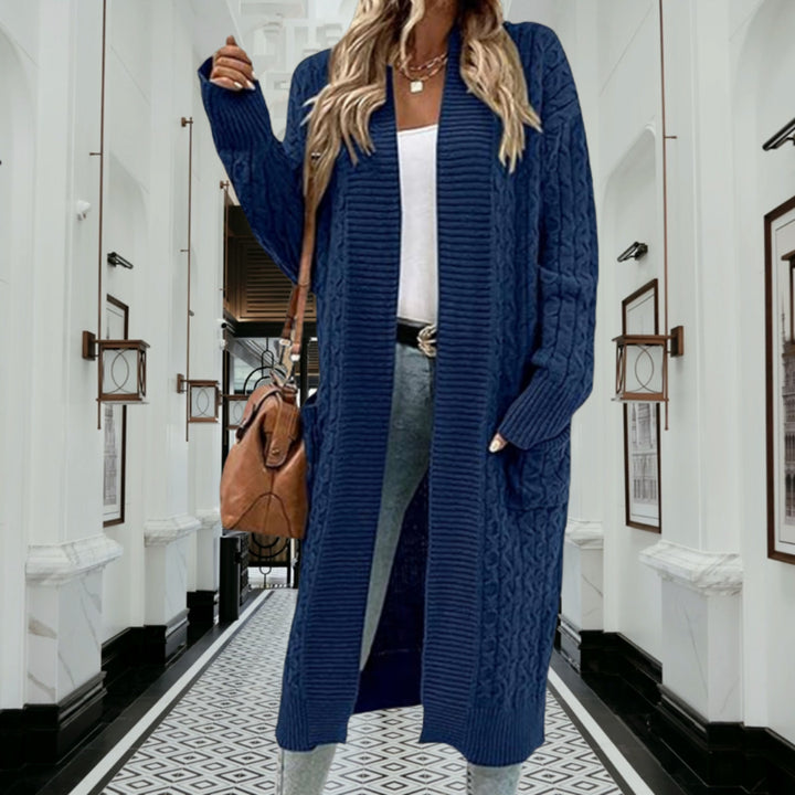 Women's knitted jacket with chunky braid design and practical pockets Lune London