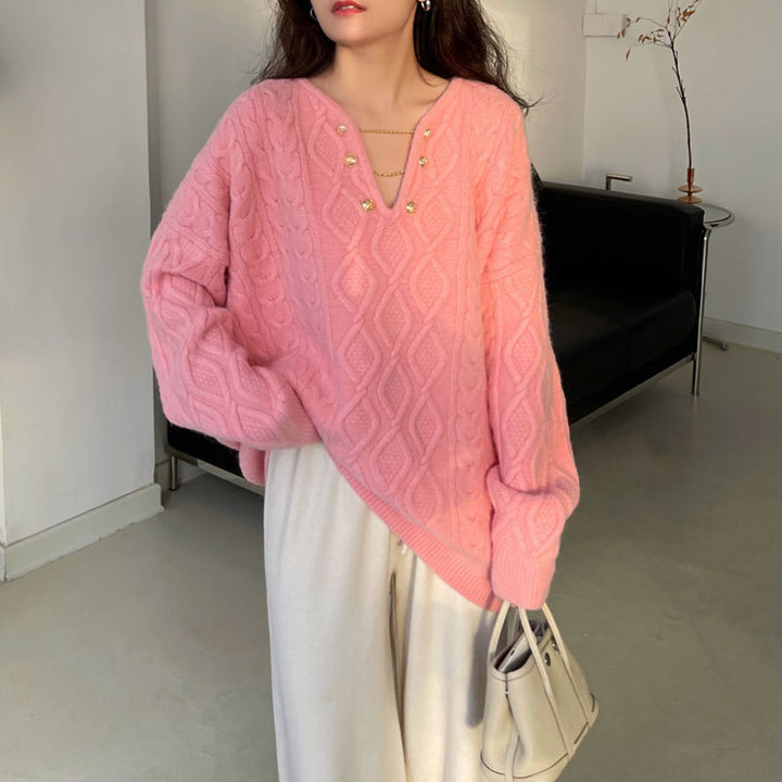 Pull ample en tricot pour dames avec détails en boutons et motif en maille torsadée Chic & Stil