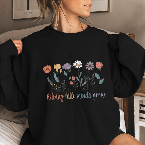 Sweat-shirt femme avec des manches volumineuses et un imprimé floral motivant Chic & Stil