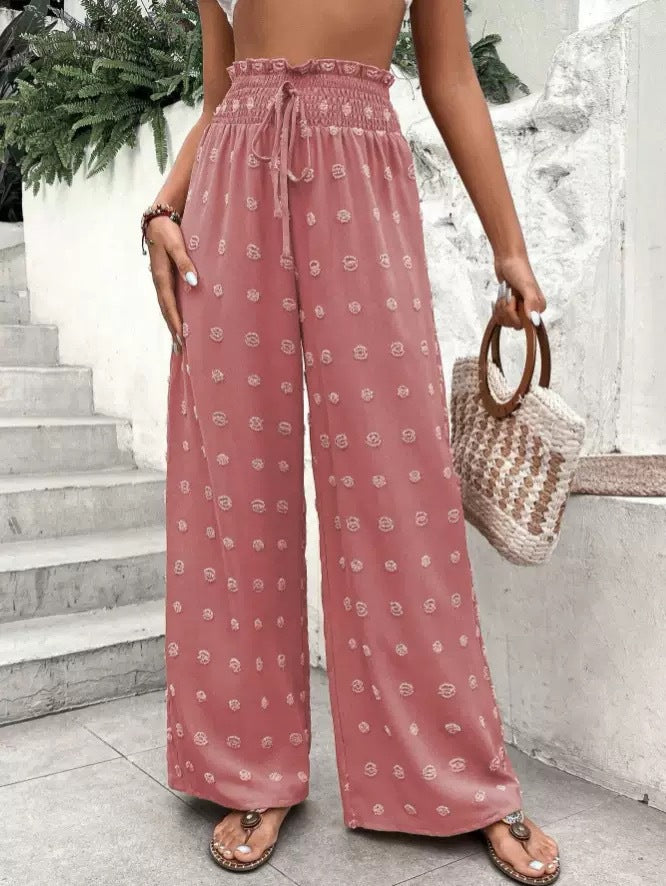 Wide palazzo pants for women with elastic waistband and decorative pattern Lune London