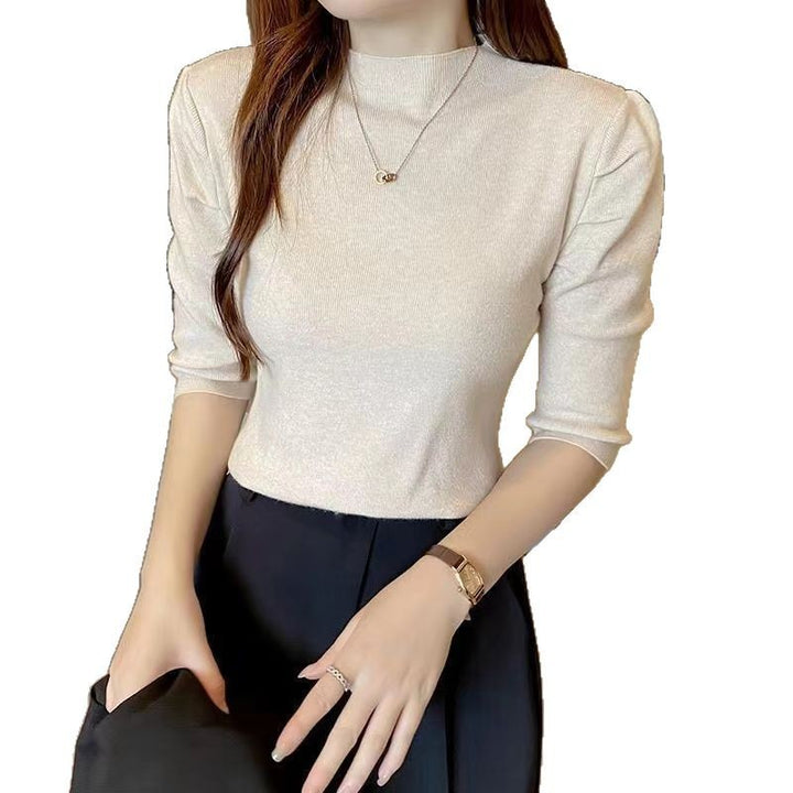 Haut élégant pour femmes avec des manches bouffantes et un tricot de haute qualité Chic & Stil