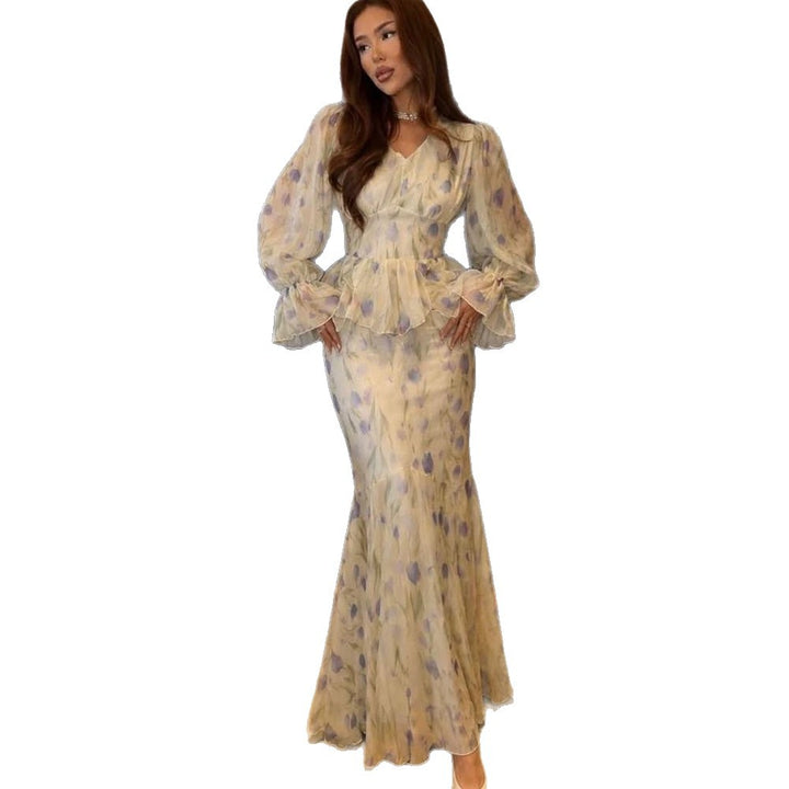Women's dress made of transparent chiffon with fitted bodice, ruffled peplum and voluminous bell sleeves Amarae