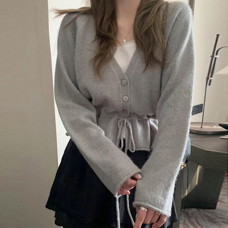 Cardigan pour femmes avec ceinture ajustable et manches aérées Chic & Stil