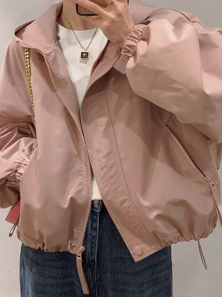 Women's oversized bomber-style hooded jacket with drawstring, elastic cuffs, and side zip pockets Amarae