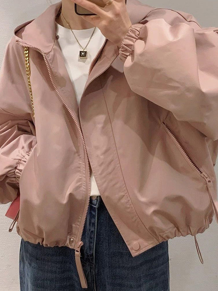 Women's oversized bomber-style hooded jacket with drawstring, elastic cuffs, and side zip pockets Amarae