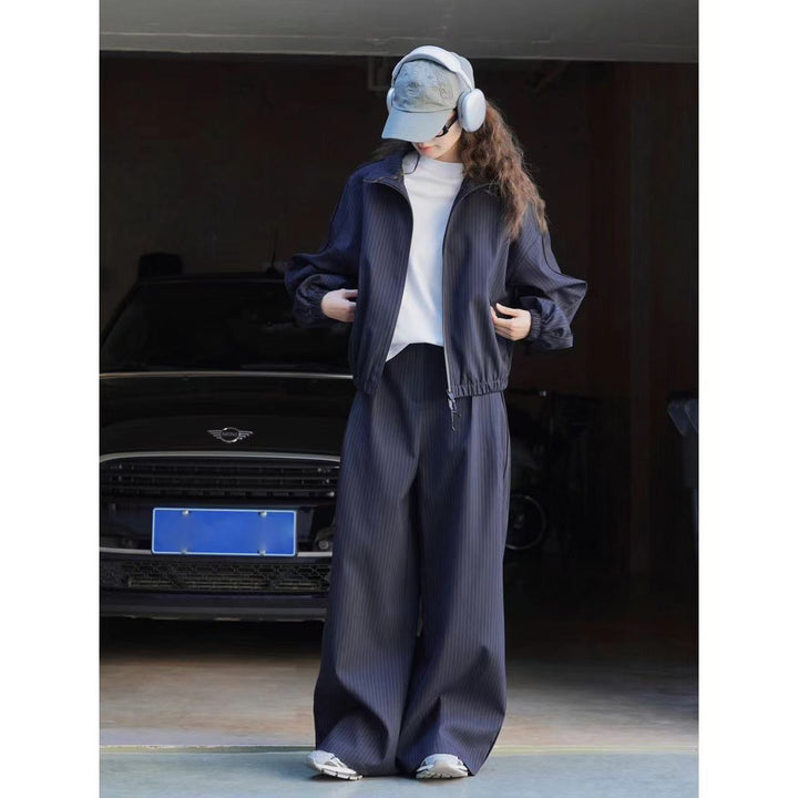 Women's loose pinstripe training jacket with stand-up collar, zipper and elastic hem Amarae