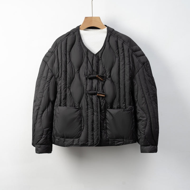 Quilted ladies' jacket with practical button closure and comfortable pockets Lune London