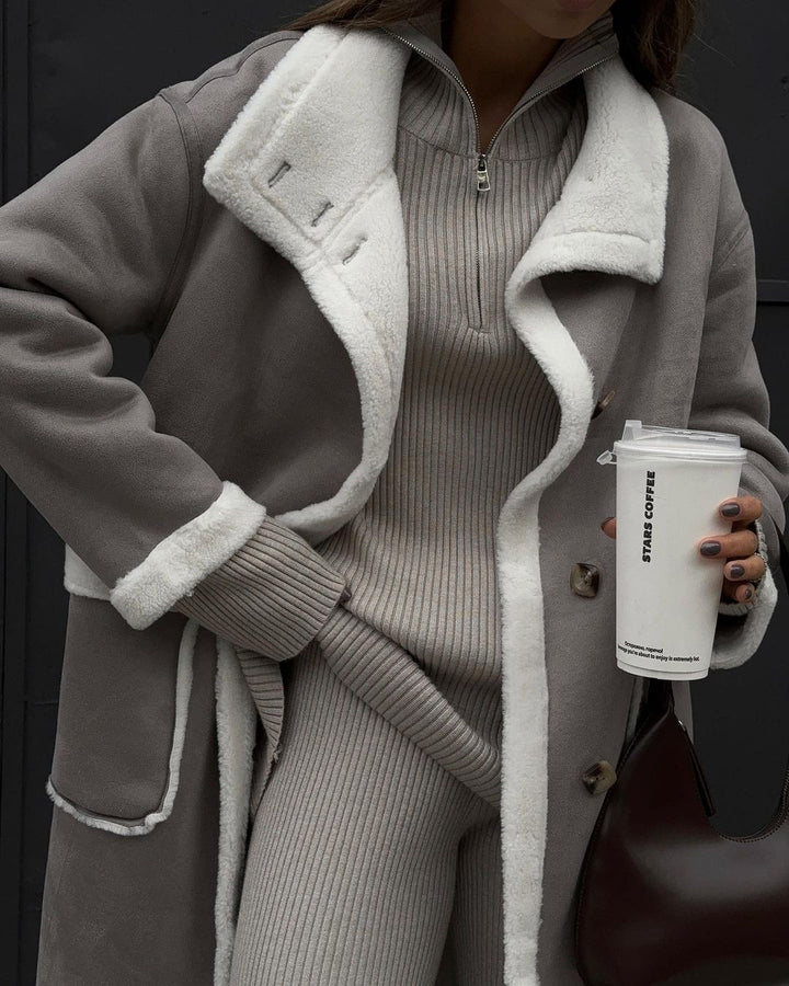 Ladies elegant and warm fleece coat with oversized cut and stylish button placket