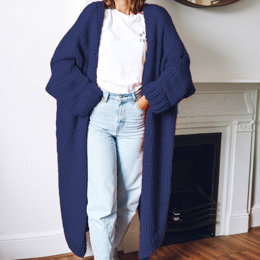 Women Large knitted coat with deep pockets and voluminous sleeves Lune London