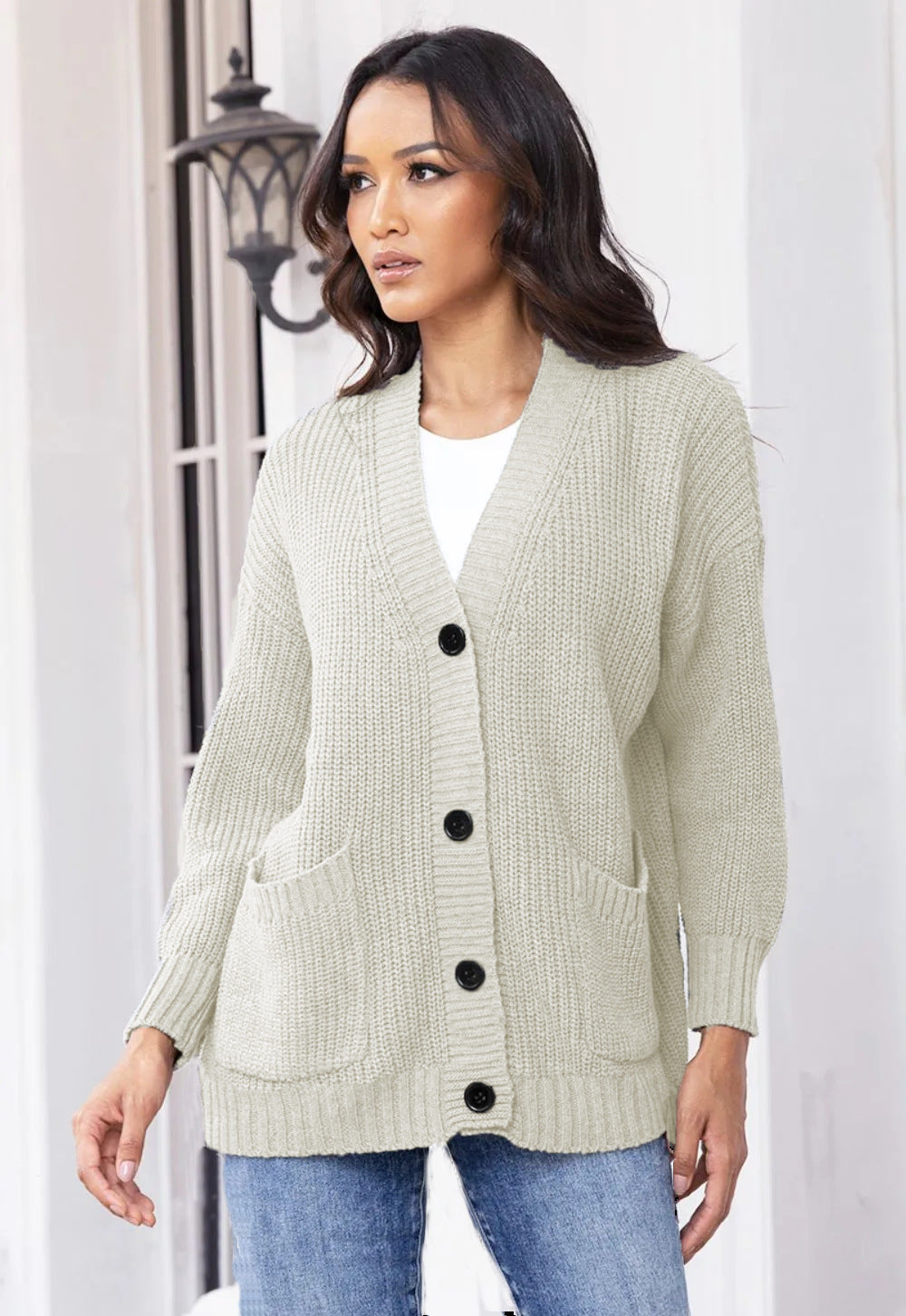 Ladies Chunky Knit Cardigan with practical pockets and classic button closure Lune London