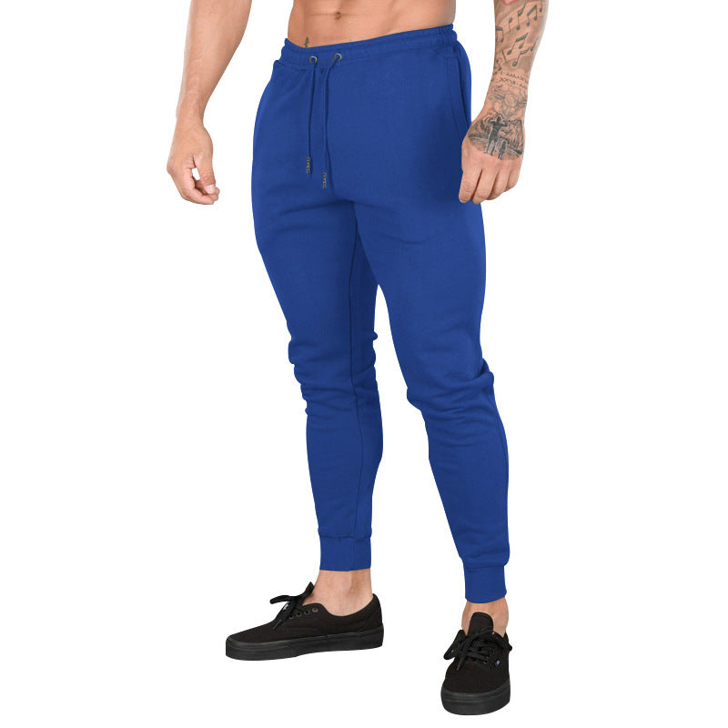 Men's sporty jogger pants with elastic waistband and practical zip pockets Lune London