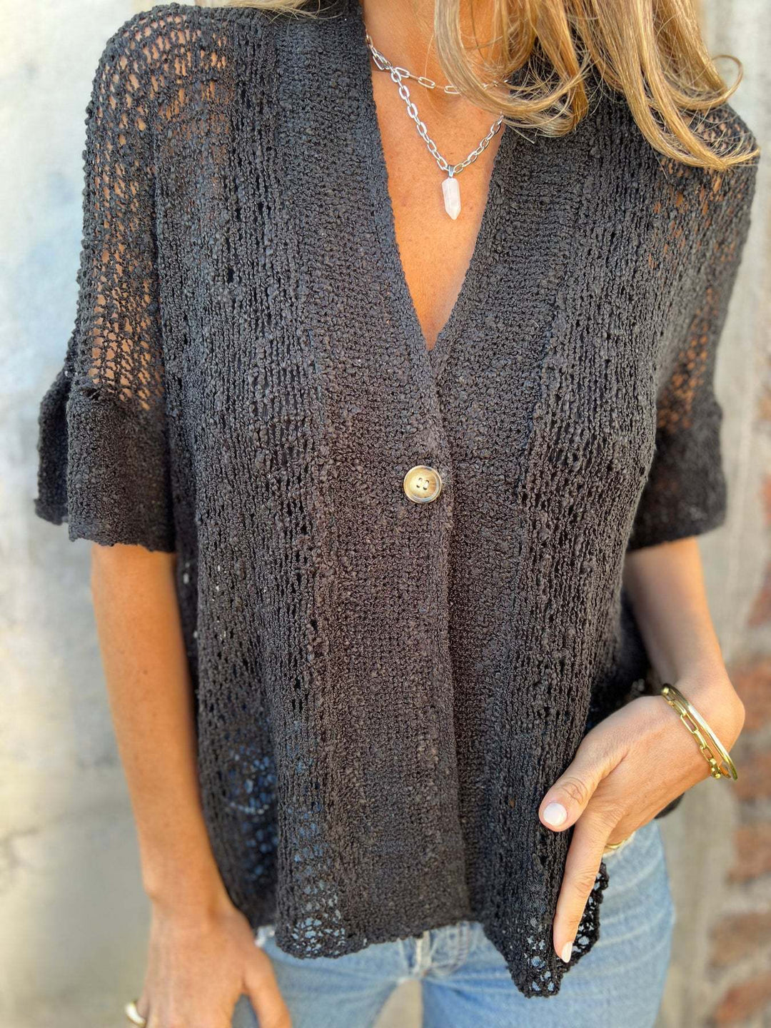 Lightweight knitted jacket for women with elegant button placket Lune London
