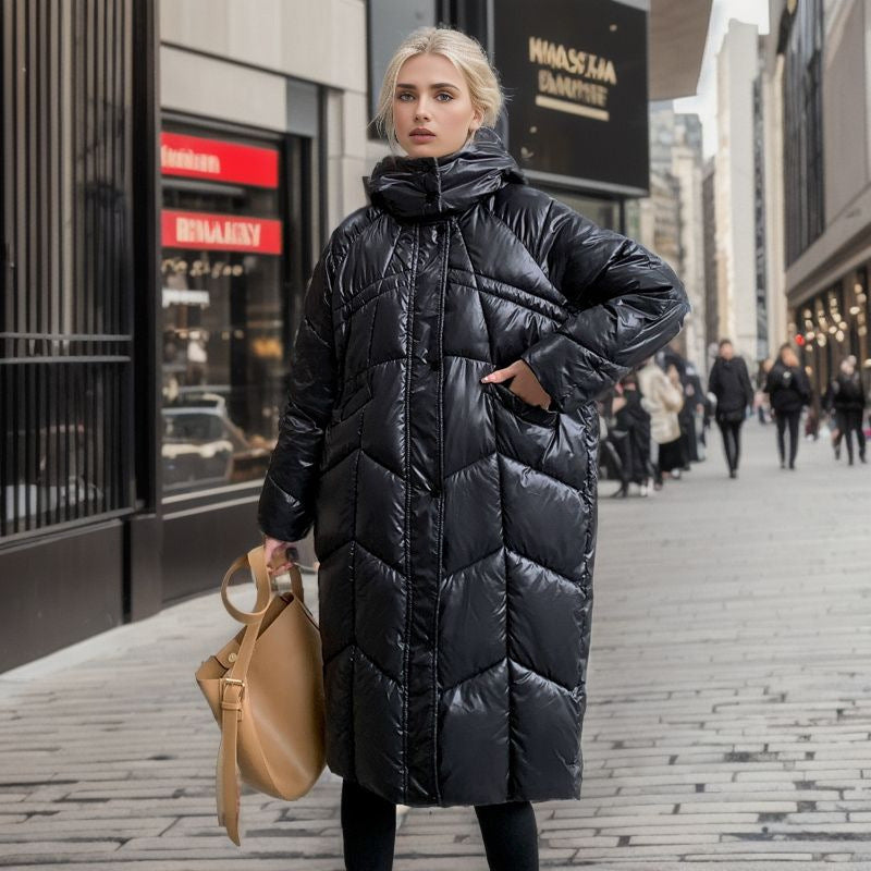Lune London | Women's long insulated puffer jacket with voluminous cut and practical side pockets