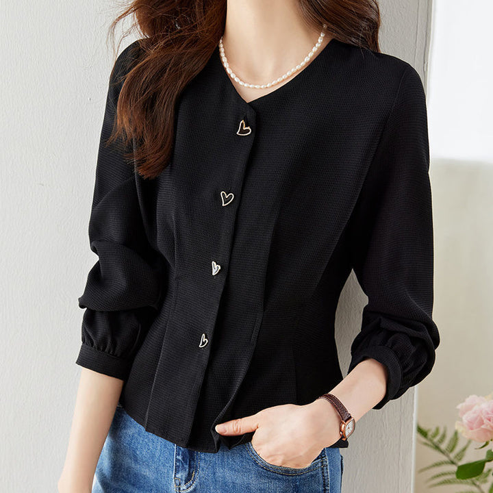 Blouse élégante pour femmes avec des détails de bouton en forme de cœur et des manches volumineuses Chic & Stil