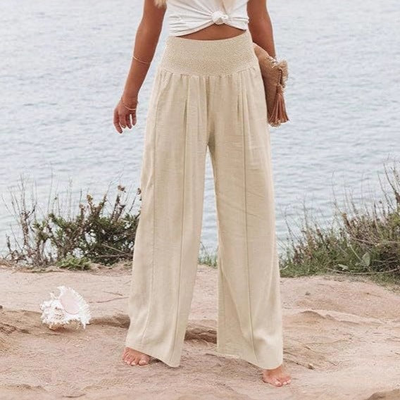 Elegant and wide Palazzo trousers for women with high waist and draping Lune London