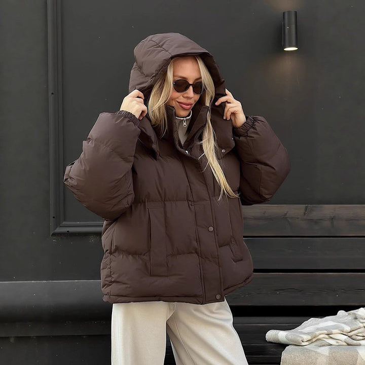 Women's short-cut oversized quilted jacket with high stand-up collar and concealed snap button placket Amarae