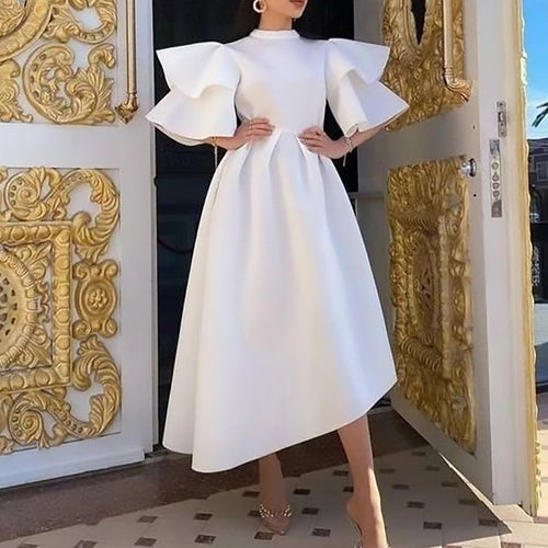 Midi dress for women with voluminous puff sleeves and an asymmetrical hem Amarae