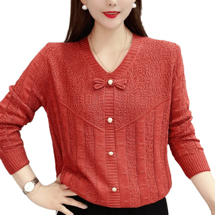 Women knit top with decorative pearl buttons and a refined bow design Lune London