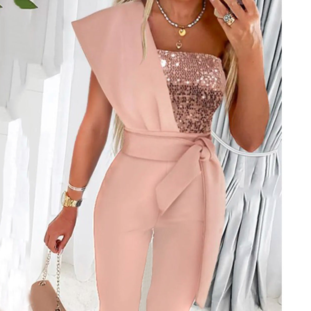 One-shoulder jumpsuit for women with a sparkling top and a chic waist belt und Stil