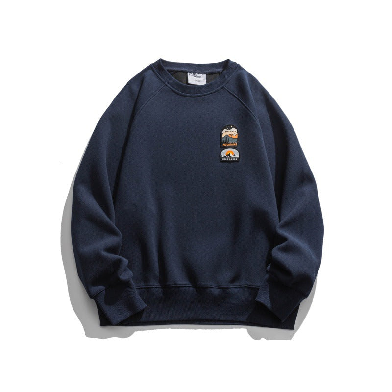 Unisex Oversize Sweatshirt with raglan sleeves and mountain patch Amarae