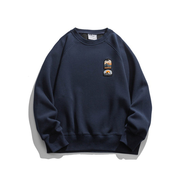 Unisex Oversize Sweatshirt with raglan sleeves and mountain patch Amarae