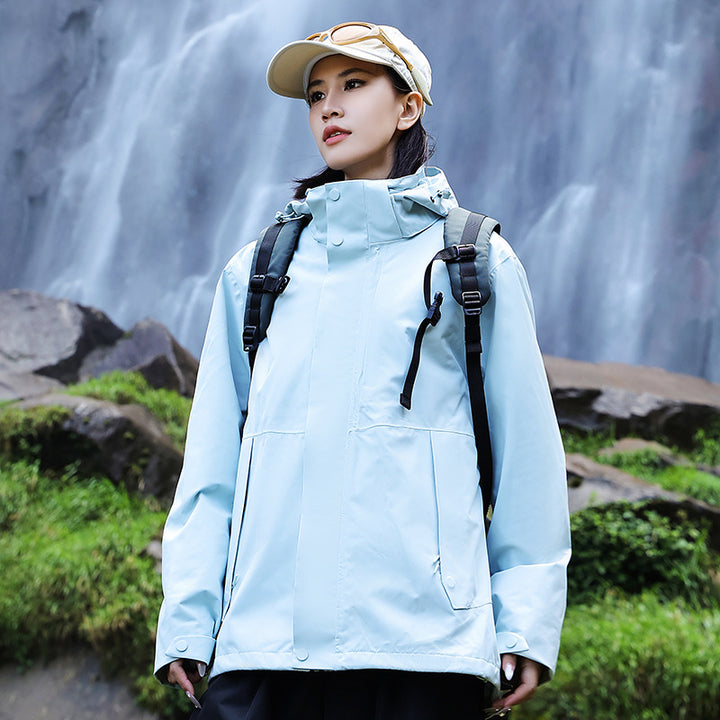 Women’s technical multi-layer hardshell rain jacket with adjustable hood, chest strap, and water-resistant zippers Amarae