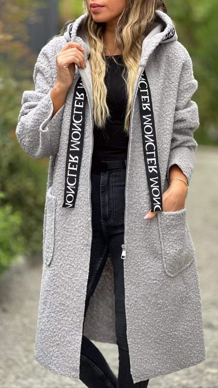 Trendy oversized fleece coat for women with practical pockets and hood Lune London