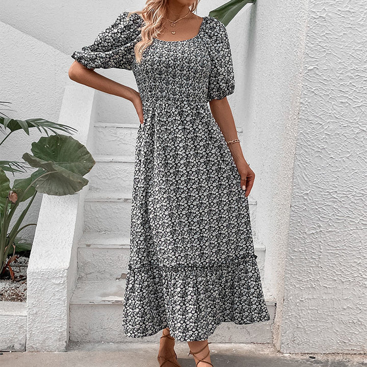 Maxi dress for women with floral print and crossed back detail Lune London