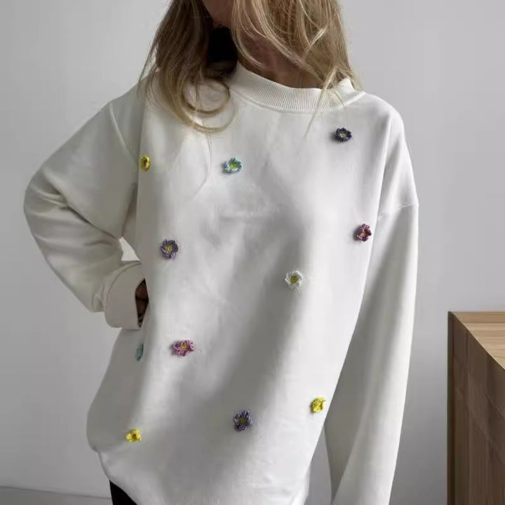 Women comfortable sweatshirt with colorful floral applications Lune London