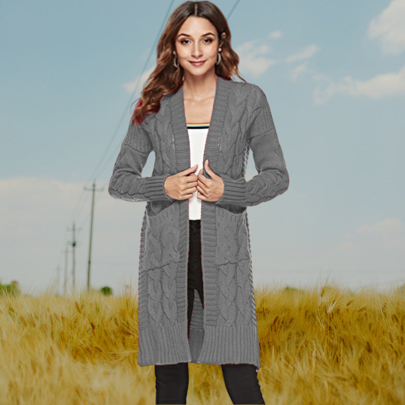 Knitted cardigan for women with a modern weaving pattern and practical pockets Lune London