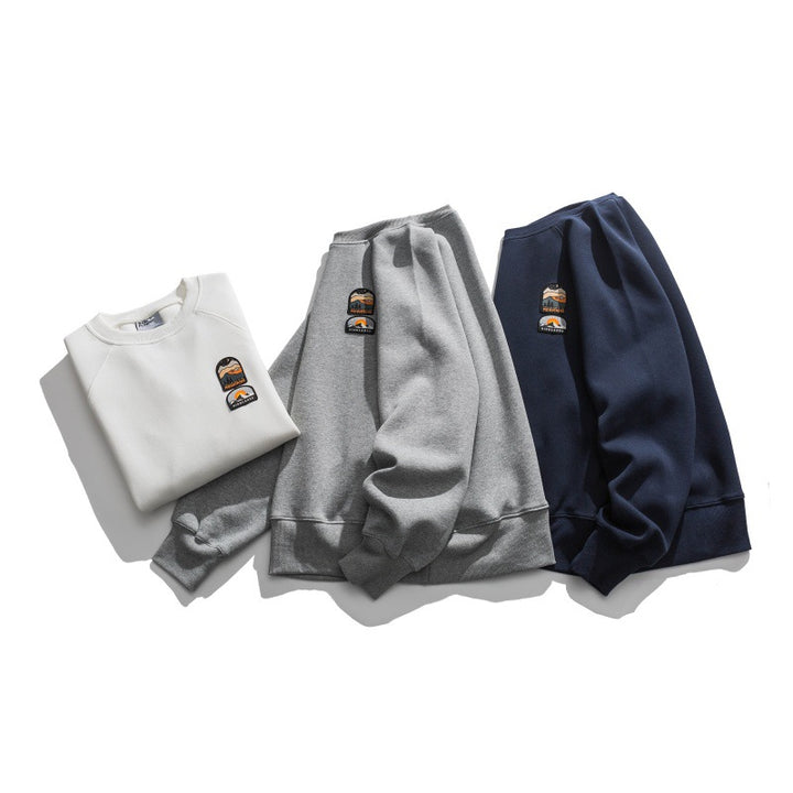 Unisex Oversize Sweatshirt with raglan sleeves and mountain patch Amarae