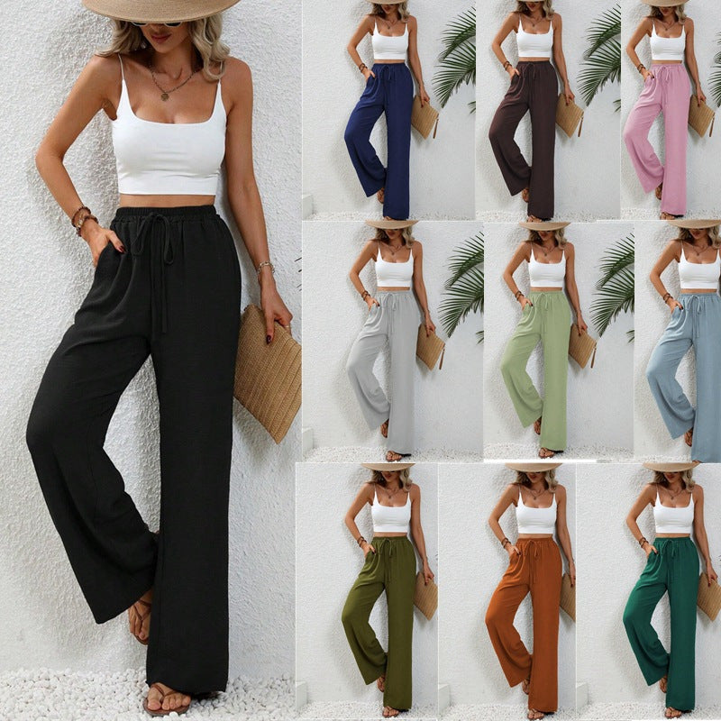 Pantalons larges d'été pour femmes avec taille élastique et poches latérales pratiques Chic & Stil