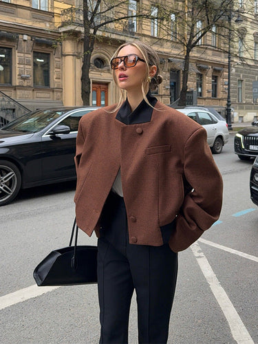 Fashionable short women's jacket with structured cut and high collar Amarae