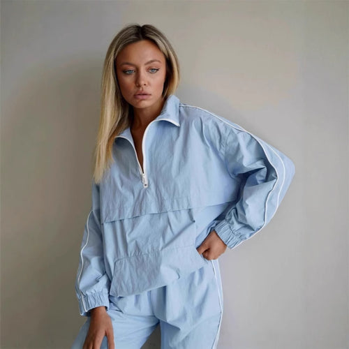 Oversized sporty women's jacket with short zip and elastic cuffs Amarae