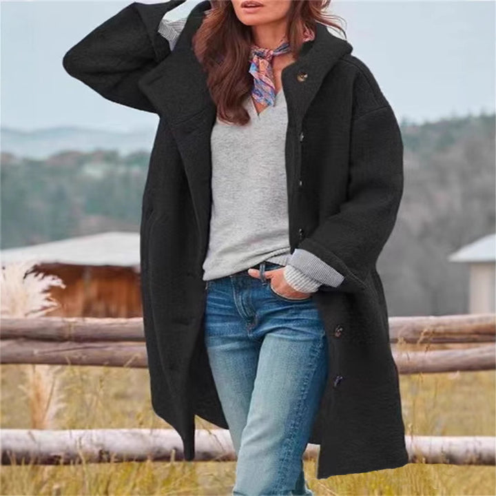 Oversized wool coat for ladies with a stylish collar and chic button details Lune London