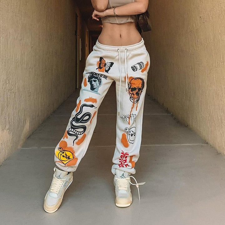 Women's graphic joggers with a high waistband, drawstring, and streetwear prints Amarae