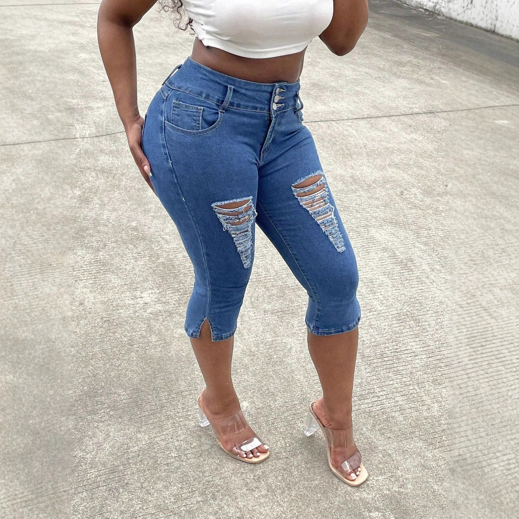 Women's high-waisted, three-quarter length stretch jeans with destroyed inserts and side seam slit Amarae