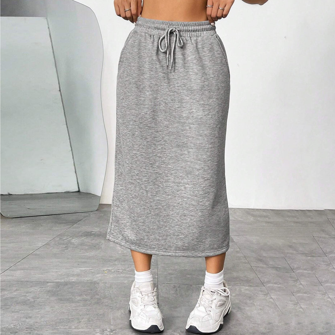 Midi jersey skirt for women with elastic waistband and welt pockets Lune London