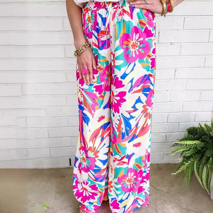 Leisure pants for women, wide, with a colorful floral pattern and an elastic waistband Lune London