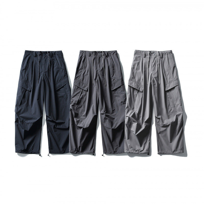Men's loose technical cargo pants with drawstring waistband and adjustable leg closures Amarae
