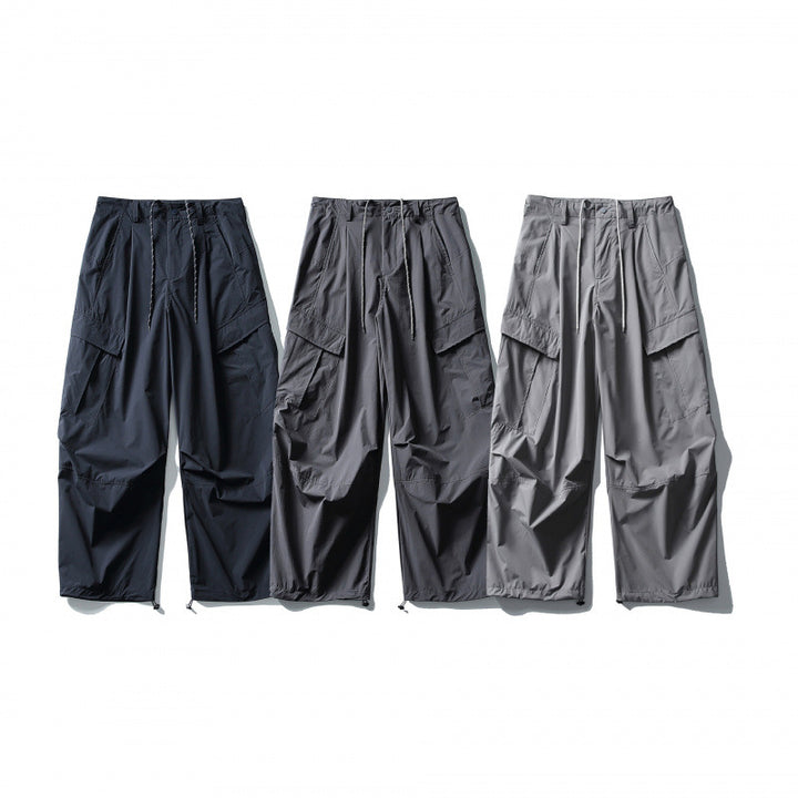 Men's loose technical cargo pants with drawstring waistband and adjustable leg closures Amarae