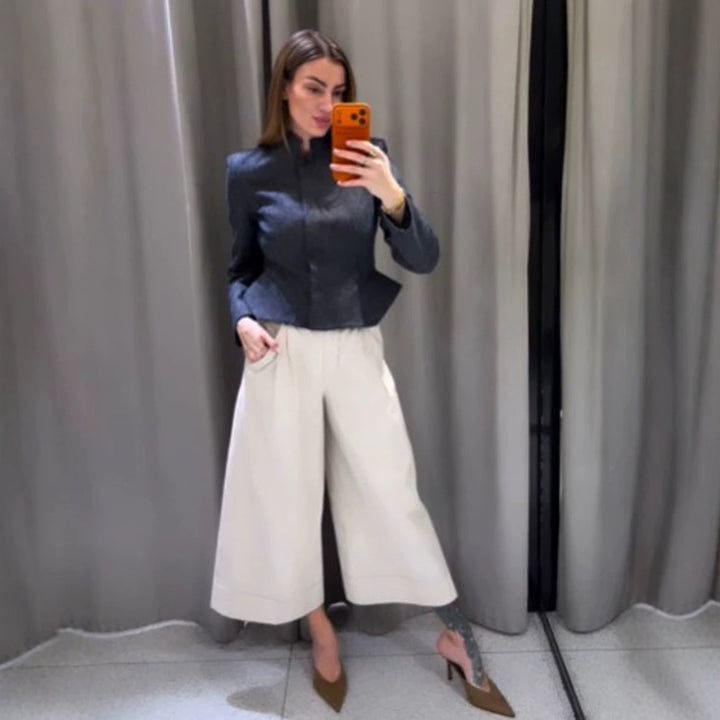 Women's short blazer with stand-up collar, fitted peplum, and concealed button placket Amarae