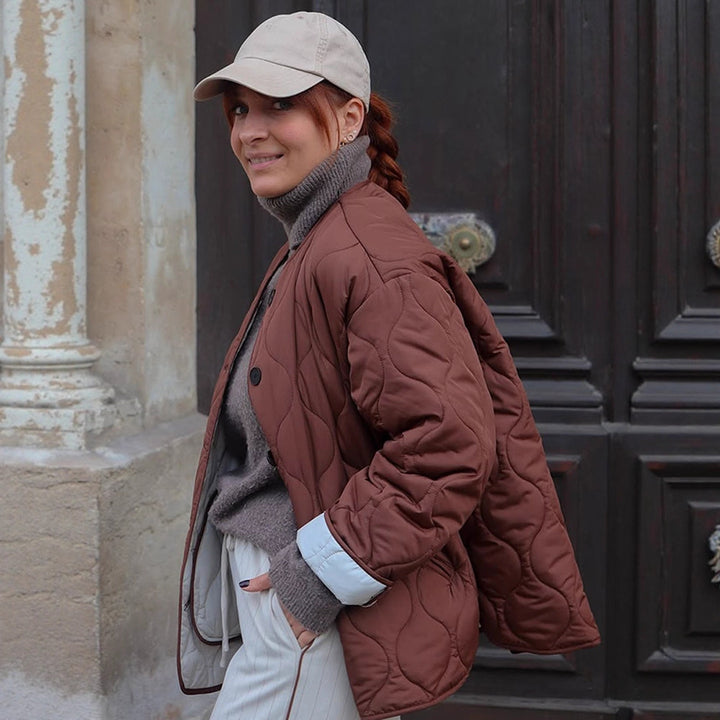 Women's quilted transitional jacket with round quilting, boxy silhouette and press stud placket Amarae