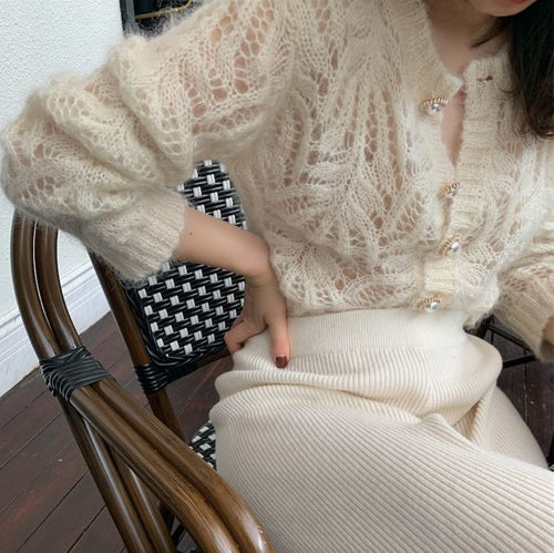 Cardigan femme avec motif ajouré et détails de boutons élégants Chic & Stil