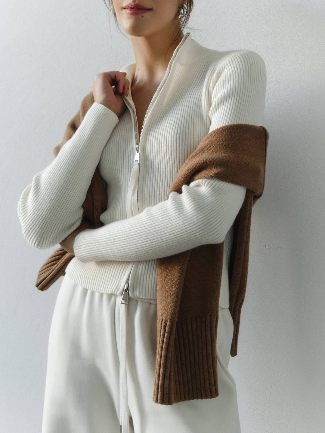 Knitted pullover for women with high zipper and ribbed structure Lune London