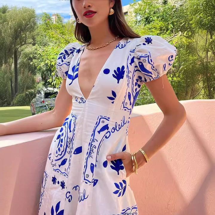 Maxi dress for women with voluminous puff sleeves and floral patterns Lune London