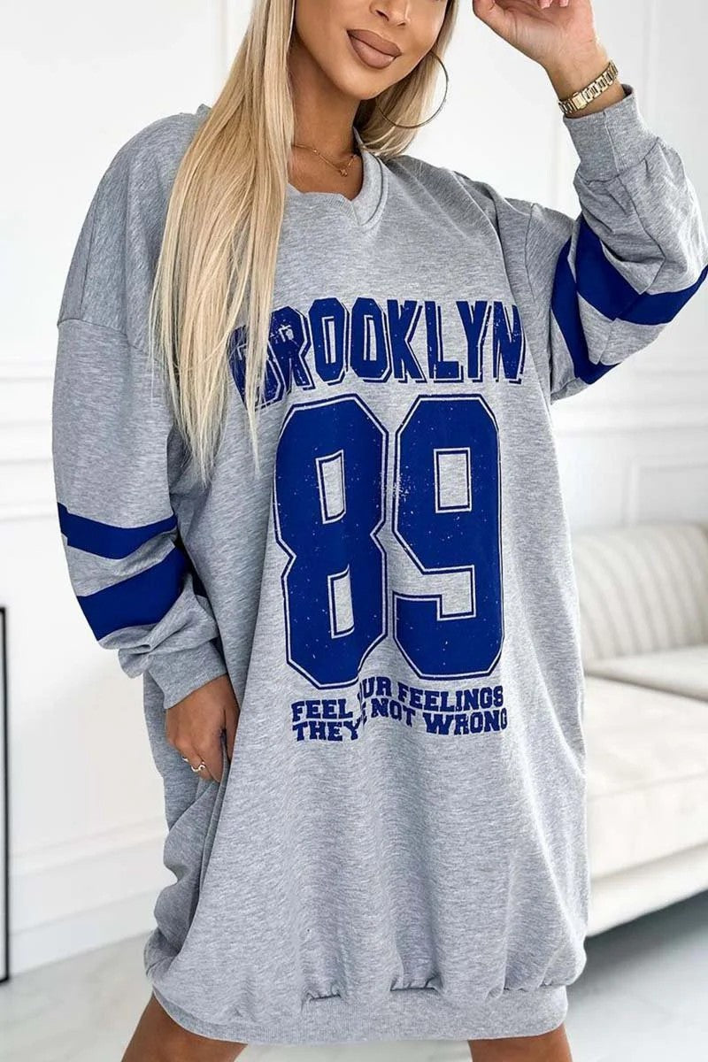 Robe décontractée surdimensionnée pour femmes au style sportif avec un col en V Chic & Stil