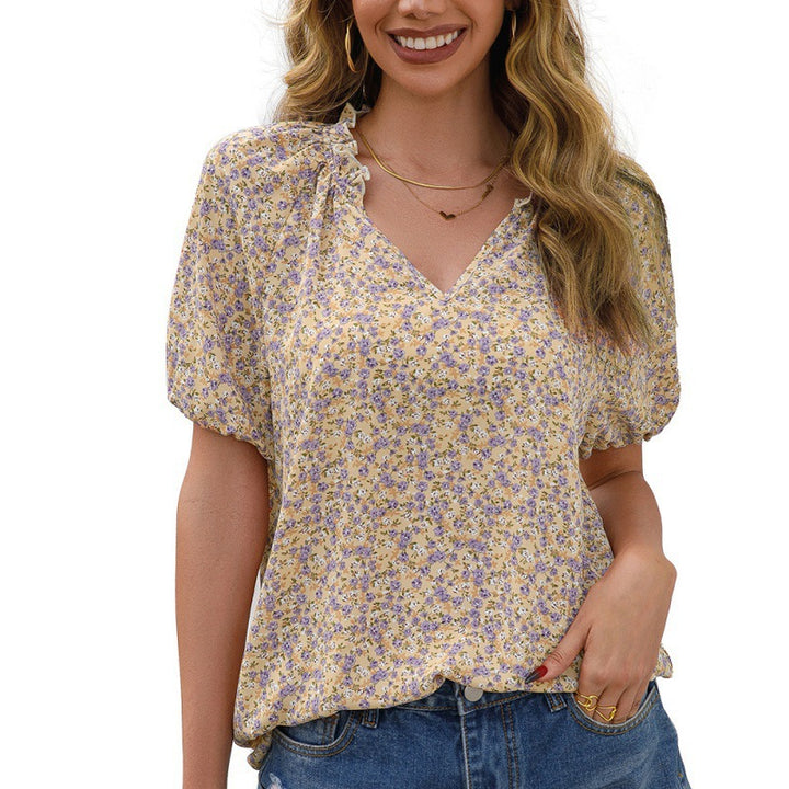 Blouse for ladies with ruffle details and a floral pattern Lune London