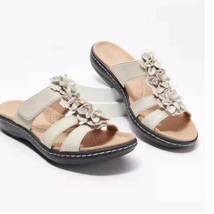 Women’s sandals with floral accent Lune London